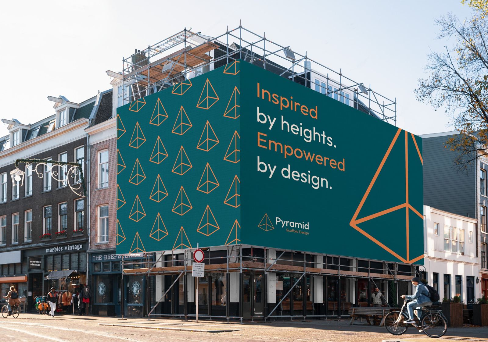 Pyramid Scaffold Design banner on a city-centre scaffold